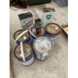 AN ASSORTMENT OF VINTAGE TINS AND CANS TO INCLUDE CASTROL AND BP CANS