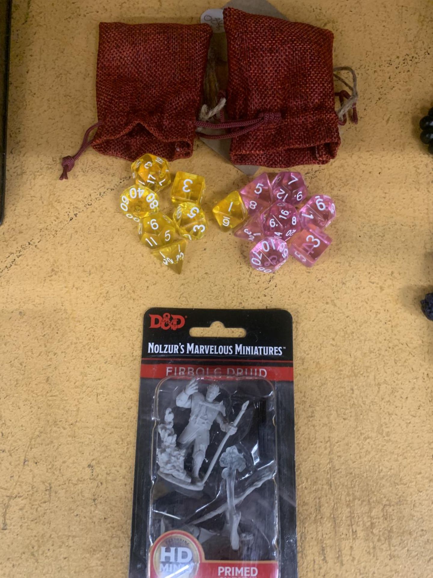 A DUNGEONS AND DRAGONS SEALED 'FIRBOLG DRUID' BY NOLZUR'S MARVELOUS MINIATURES PLUS TWO SETS OF