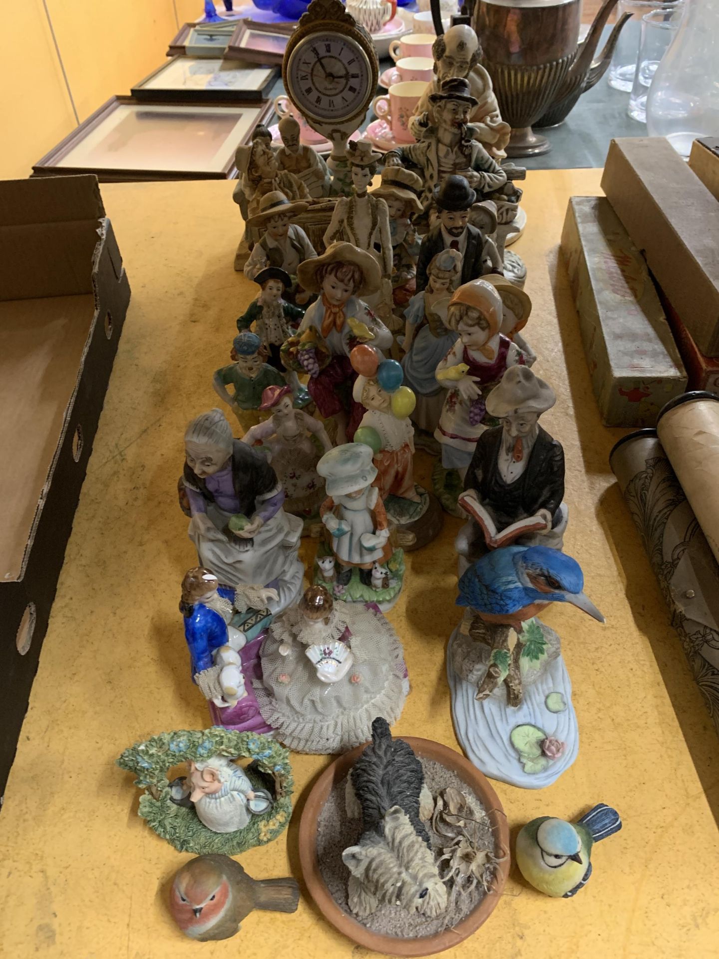 A LARGE QUANTITY OF CERAMIC FIGURINES TO INCLUDE CONTINENTAL STYLE, CAPODIMONTE STYLE, ANIMALS, ETC