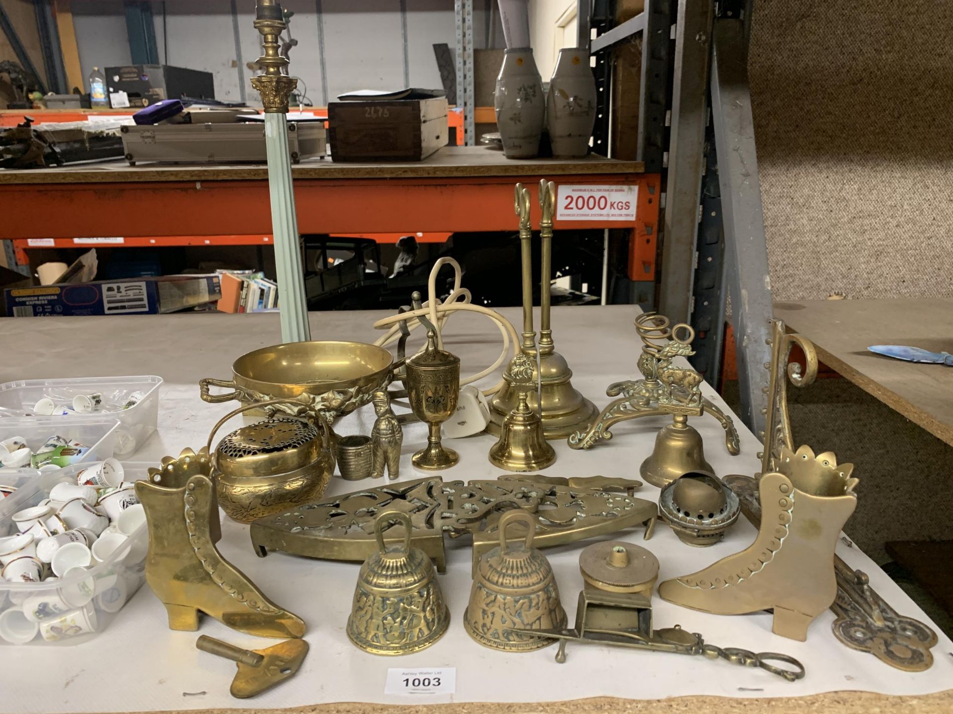 A QUANTITY OF BRASS TO INCLUDE BELLS, ORNAMENTS, BRACKETS, LAMP BASE, ETC.,