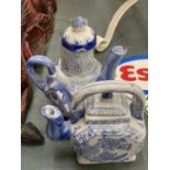 TWO ORIENTAL STYLE BLUE AND WHITE TEAPOTS