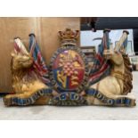 AN UNUSUAL WOODEN CARVED COAT OF ARMS PLAQUE WITH LION AND HORSE DECORATION (L:150CM H:96CM)