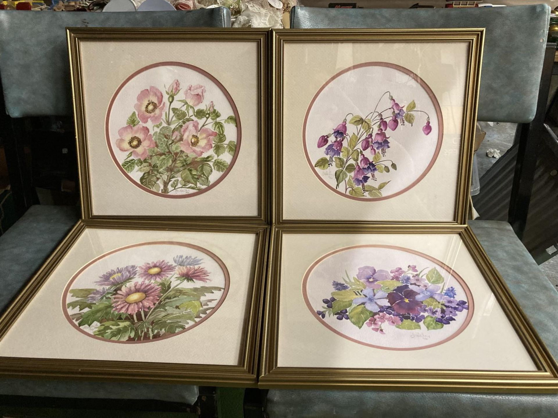 A SET OF FOUR WATERCOLOURS ON CANVAS OF FLOWERS 13 X 13 INCHES BY J M BAILEY