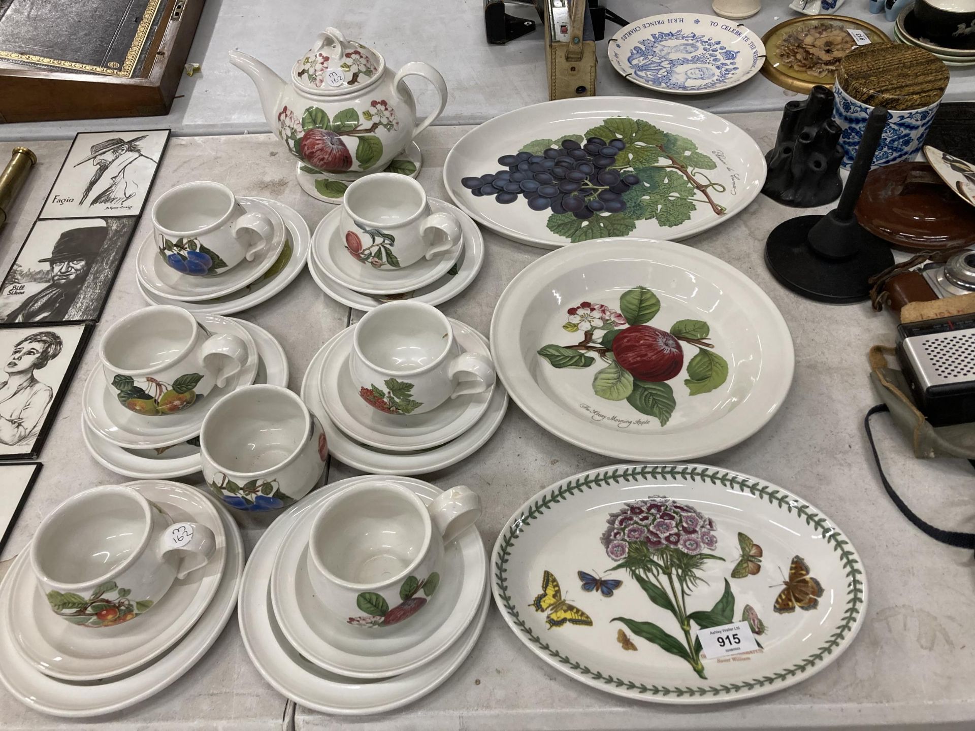 A PORTMEIRION POTTERY TEASET WITH FURTHER SERVING DISHES