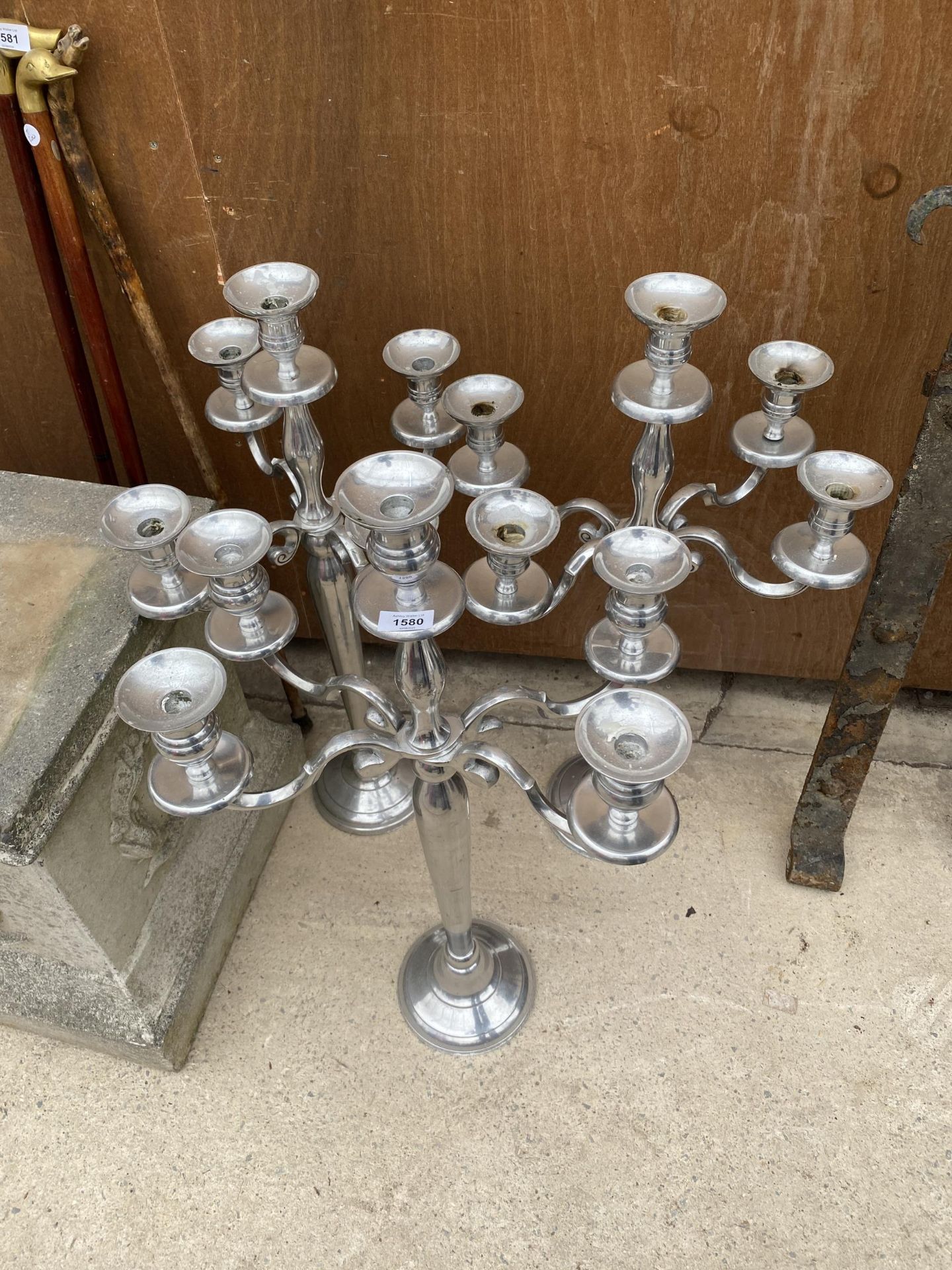 THREE FOUR BRANCH METAL CANDLESTICKS