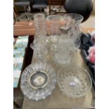 AN ASSORTMENT OF CUT GLASS WARE TO INCLUDE A WORLD CLOCK, A CLARET JUG AND VASES ETC