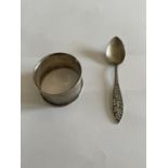 A HALLMARKED BIRMINGHAM SILVER NAPKIN RING AND A MARKED STERLING SPOON