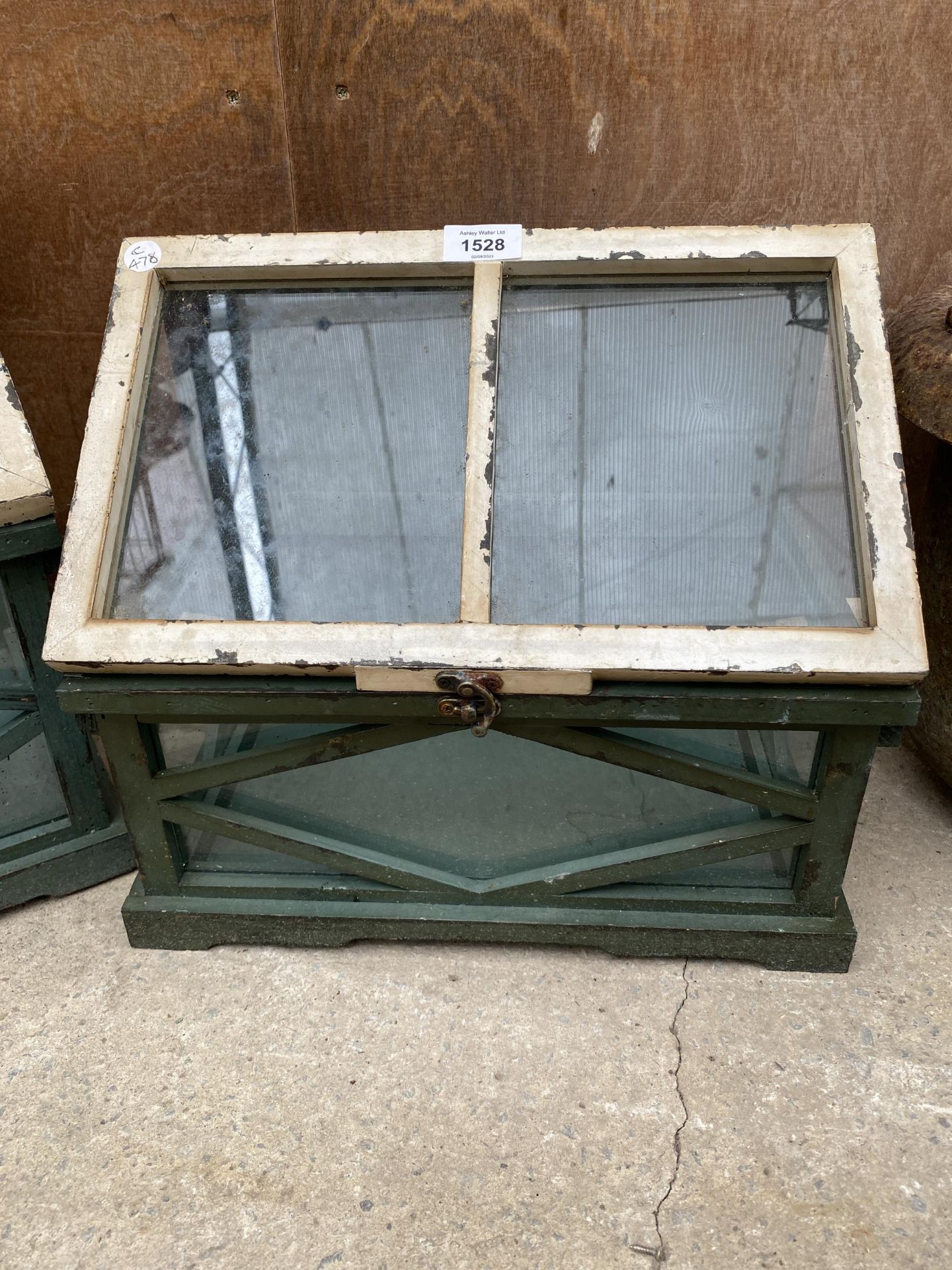 A TABLE TOP TERRARIUM GLASS HOUSE CABINET