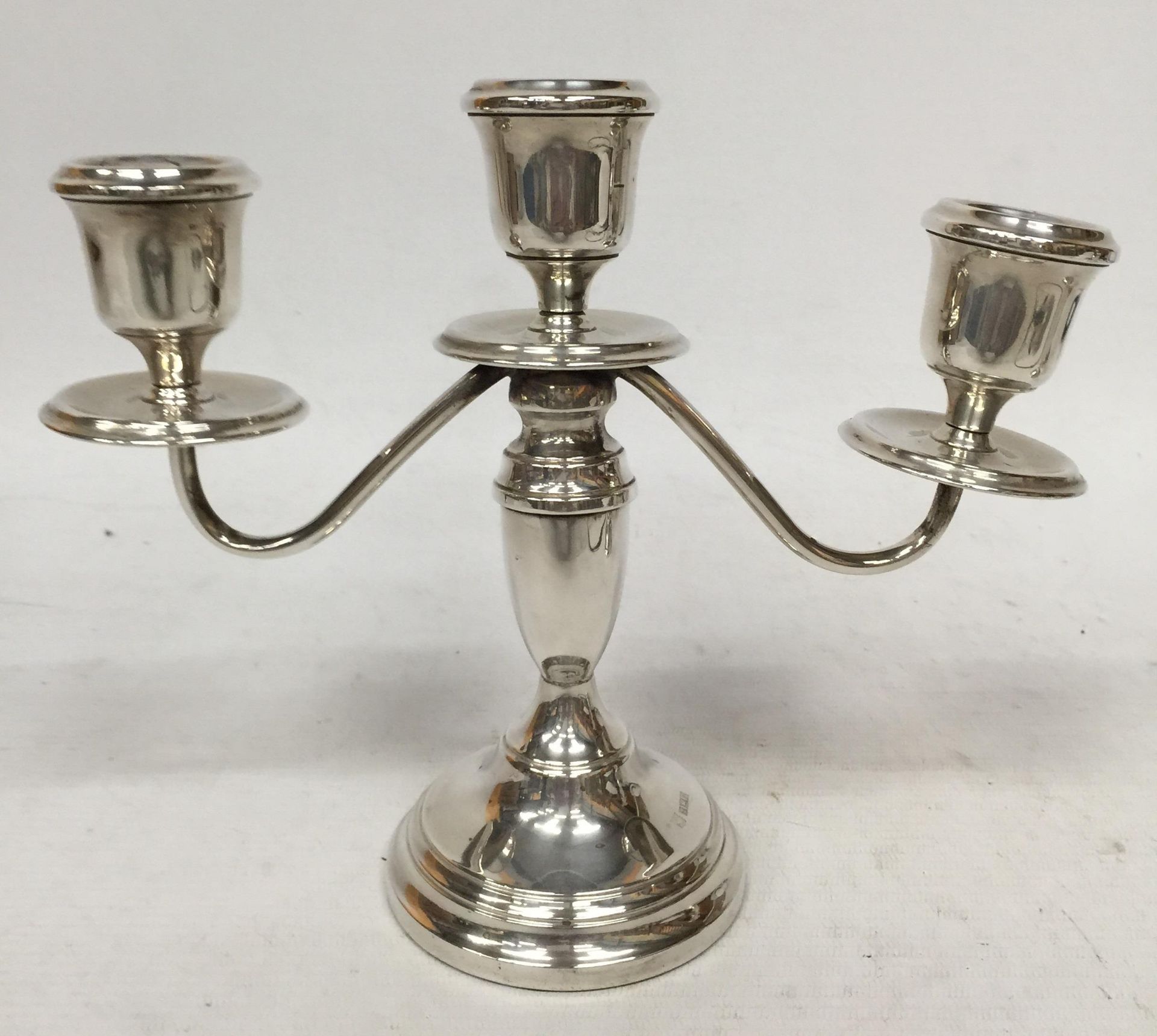 A HALLMARKED SILVER THREE BRANCH CANDLEABRA, (WEIGHTED BASE)