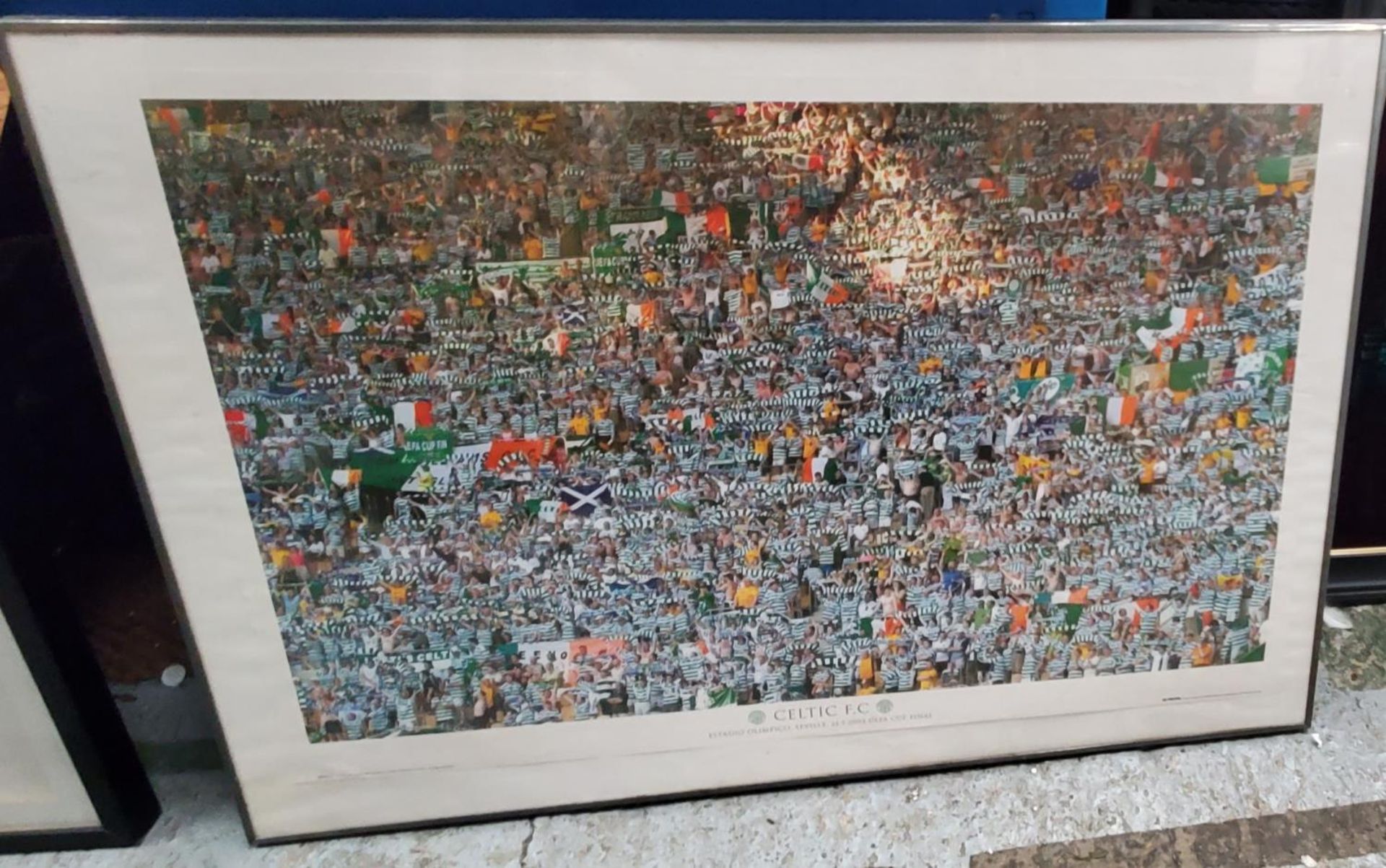 A VERY LARGE PRINT OF CELTIC FANS AT THE 2003 UEFA CUP FINAL IN SEVILLE 70CM X 101CM