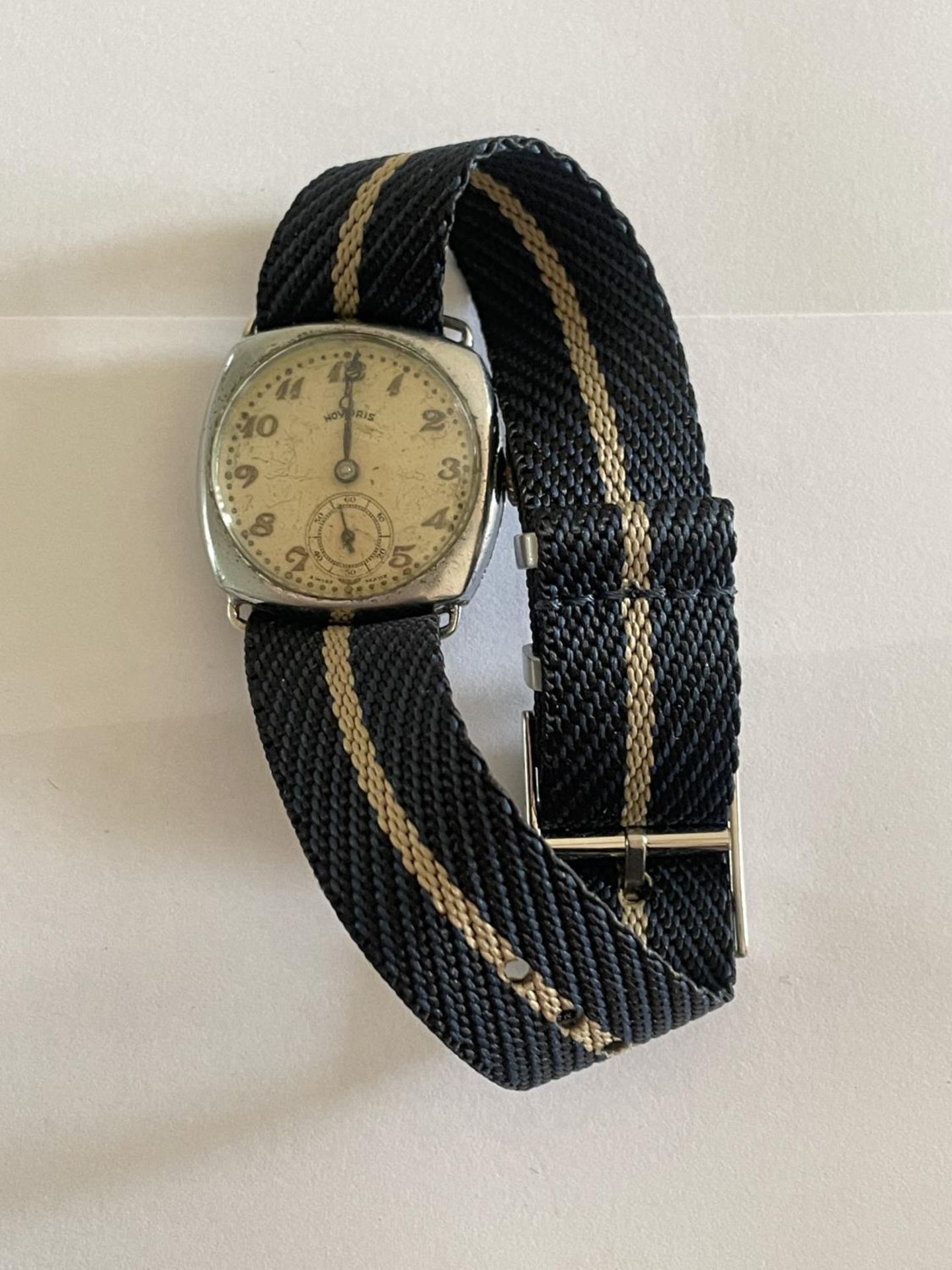 A VINTAGE SILVER WATCH NOT WORKING