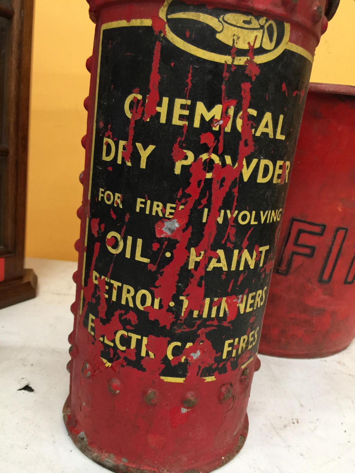 A VINTAGE RE CAST FIRE EXTINGUISHER PLUS A RED PLASTIC FIRE BUCKET - Image 2 of 3