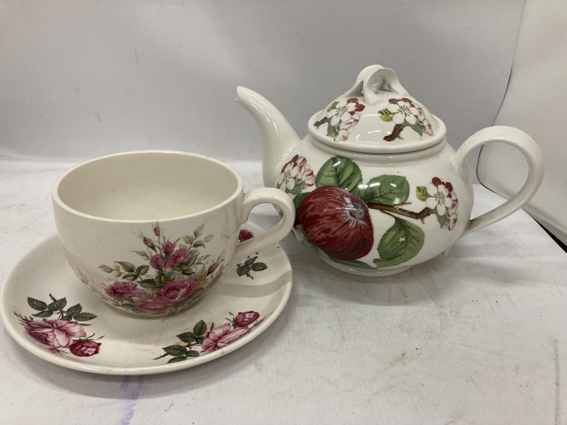 THREE PIECES OF PORTMEIRION TO INCLUDE A TEAPOT, A LARGE CUP AND SAUCER