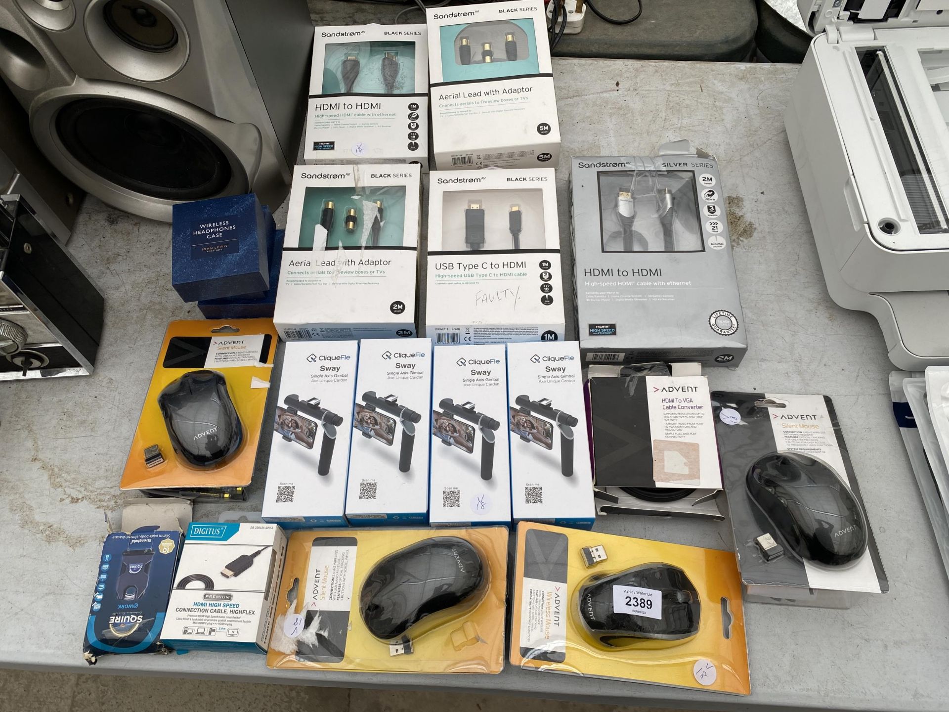 A LARGE ASSORTMENT OF NEW AND PACKAGED ITEMS TO INCLUDE WIRELESS COMPUTER MICE, HDMI CABLES AND