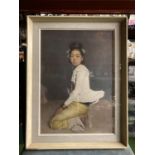 A FRAMED PRINT OF AN ASIAN GIRL BY SIR GERALD KELLY