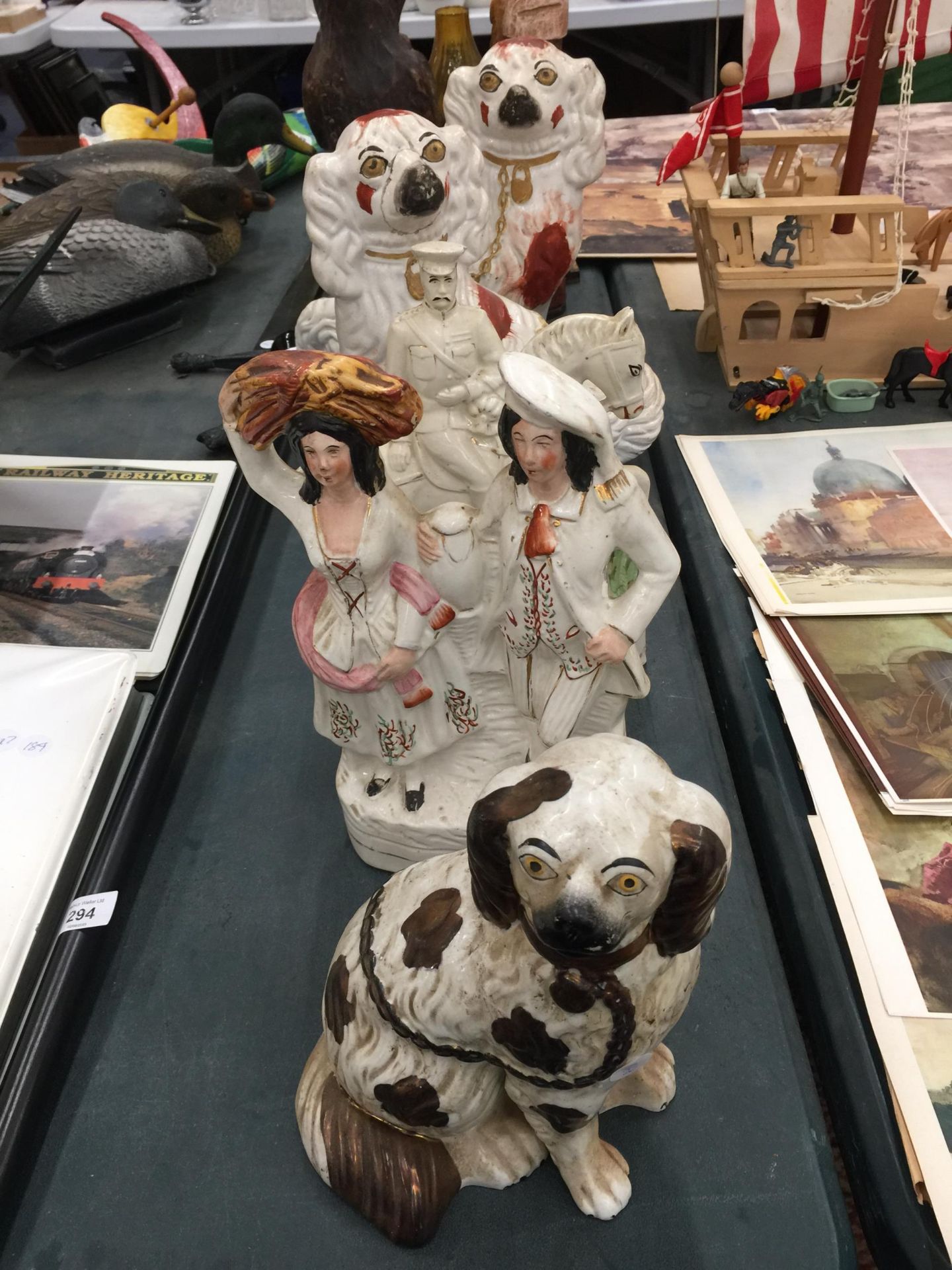 A QUANTITY OF VINTAGE STAFFORDSHIRE LARGE FIGURES TO INCLUDE THREE MANTLE DOGS, LORD KITCHENER AND A