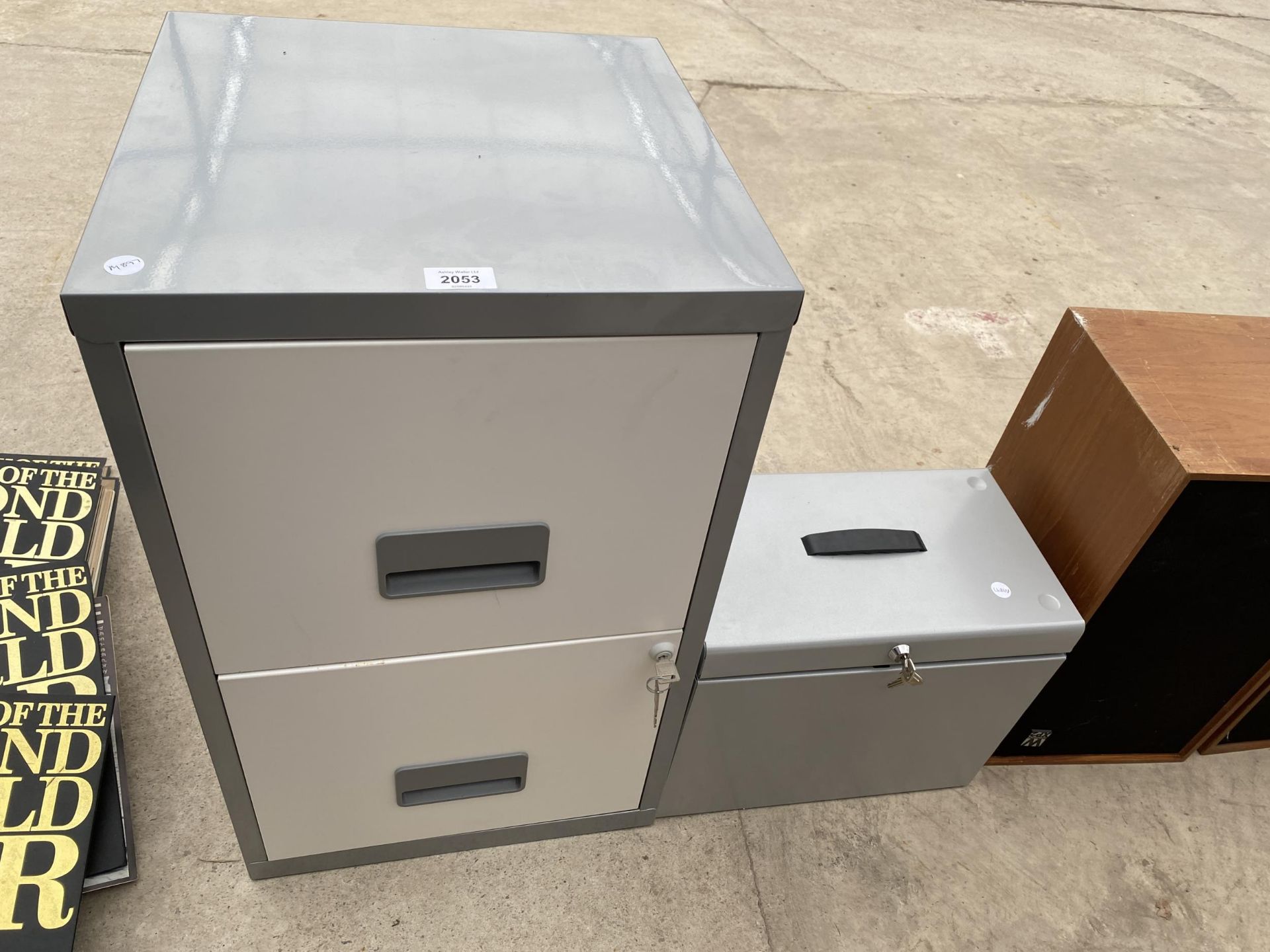 A TWO DRAWER METAL FILING CABINET AND A METAL LOCK BOX