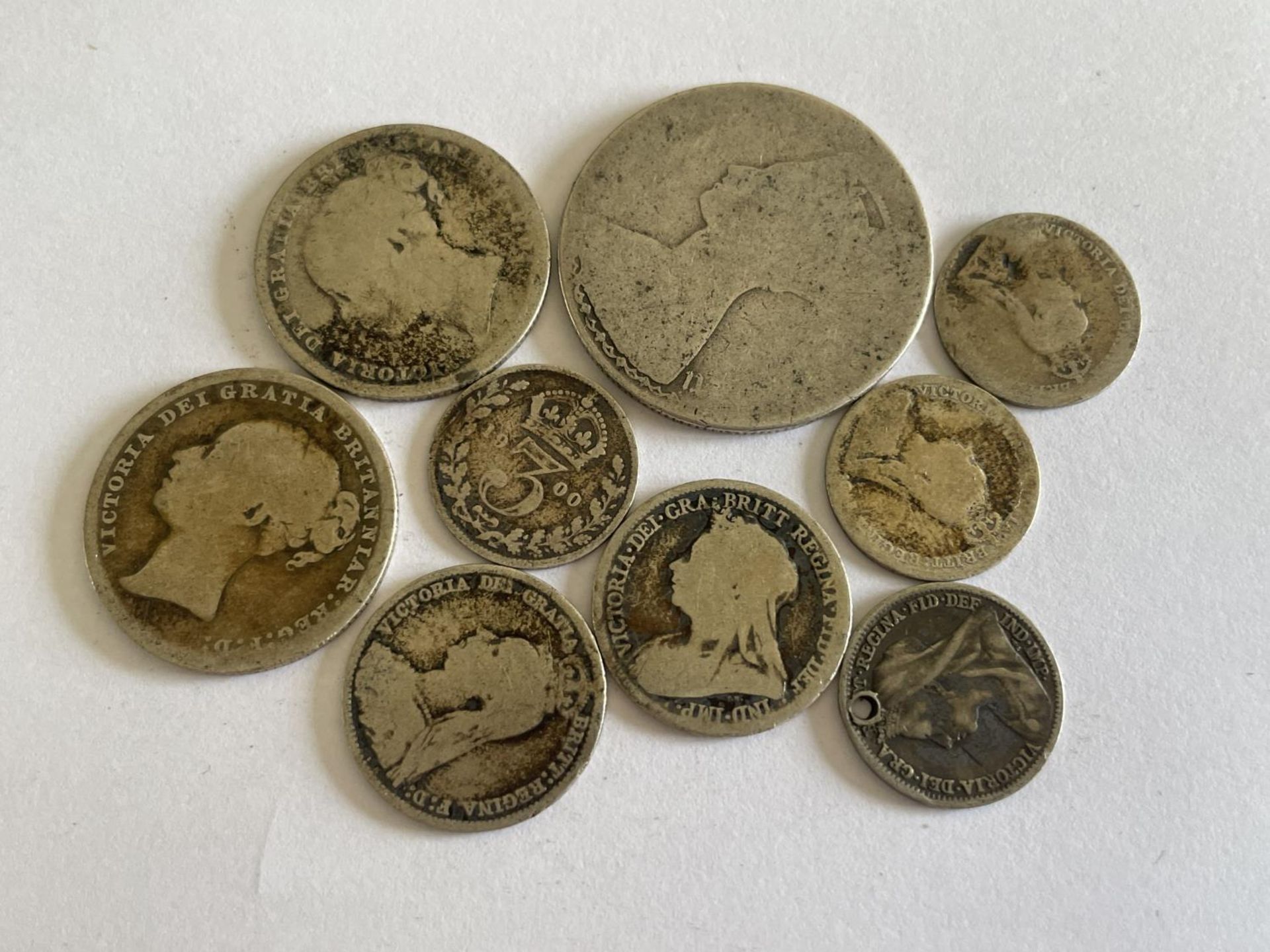 NINE VICTORIAN SILVER COINS