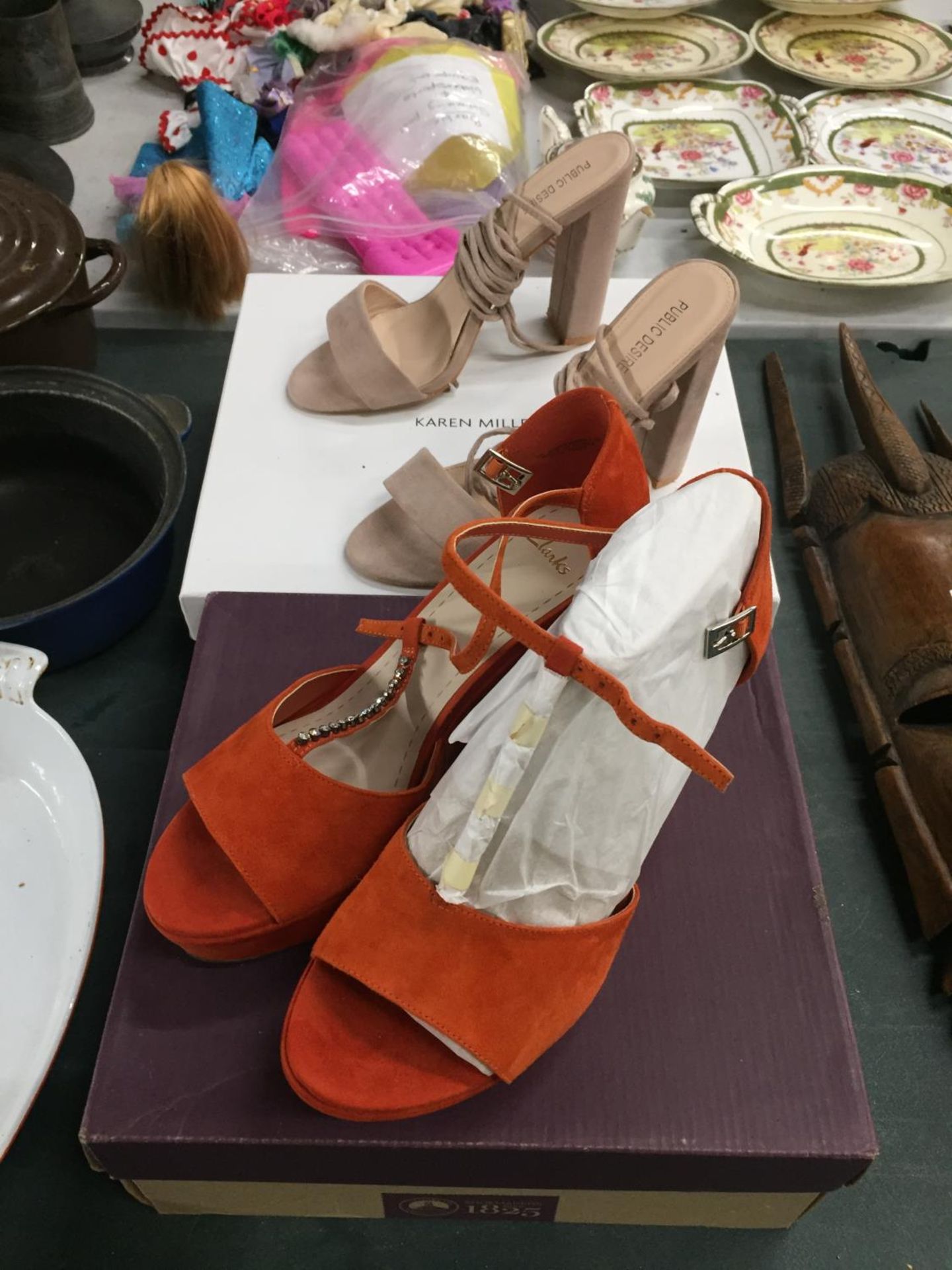 A PAIR OF KAREN MILLEN PUBLIC DESIRE SANDALS, SIZE 7 PLUS A PAIR OF CLARKS ORANGE WEDGE SANDALS SIZE