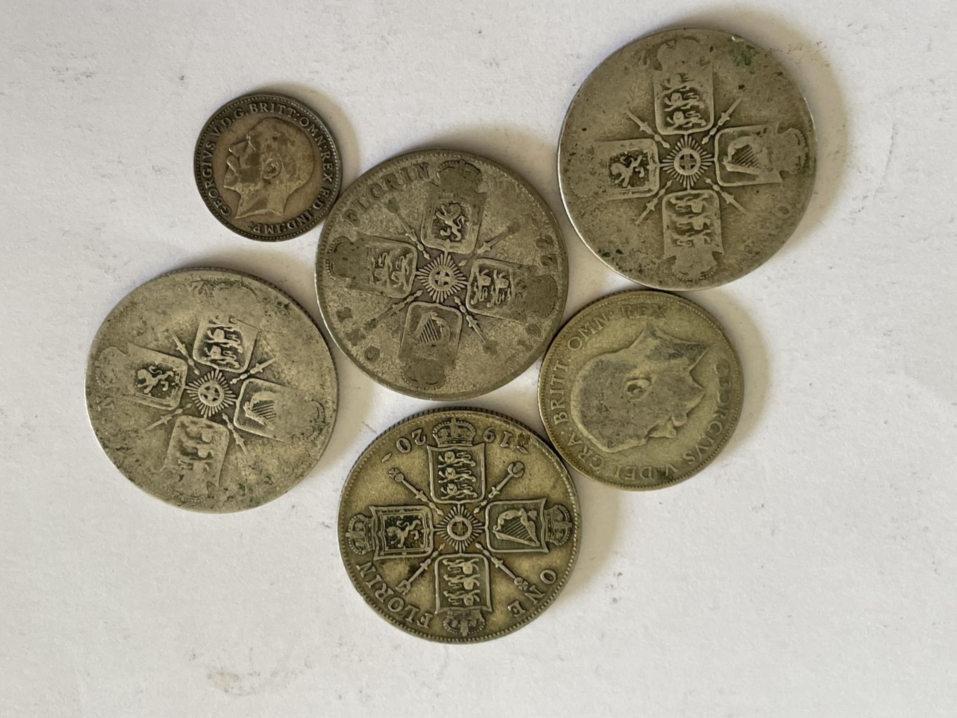 A QUANTITY OF SILVER COINS