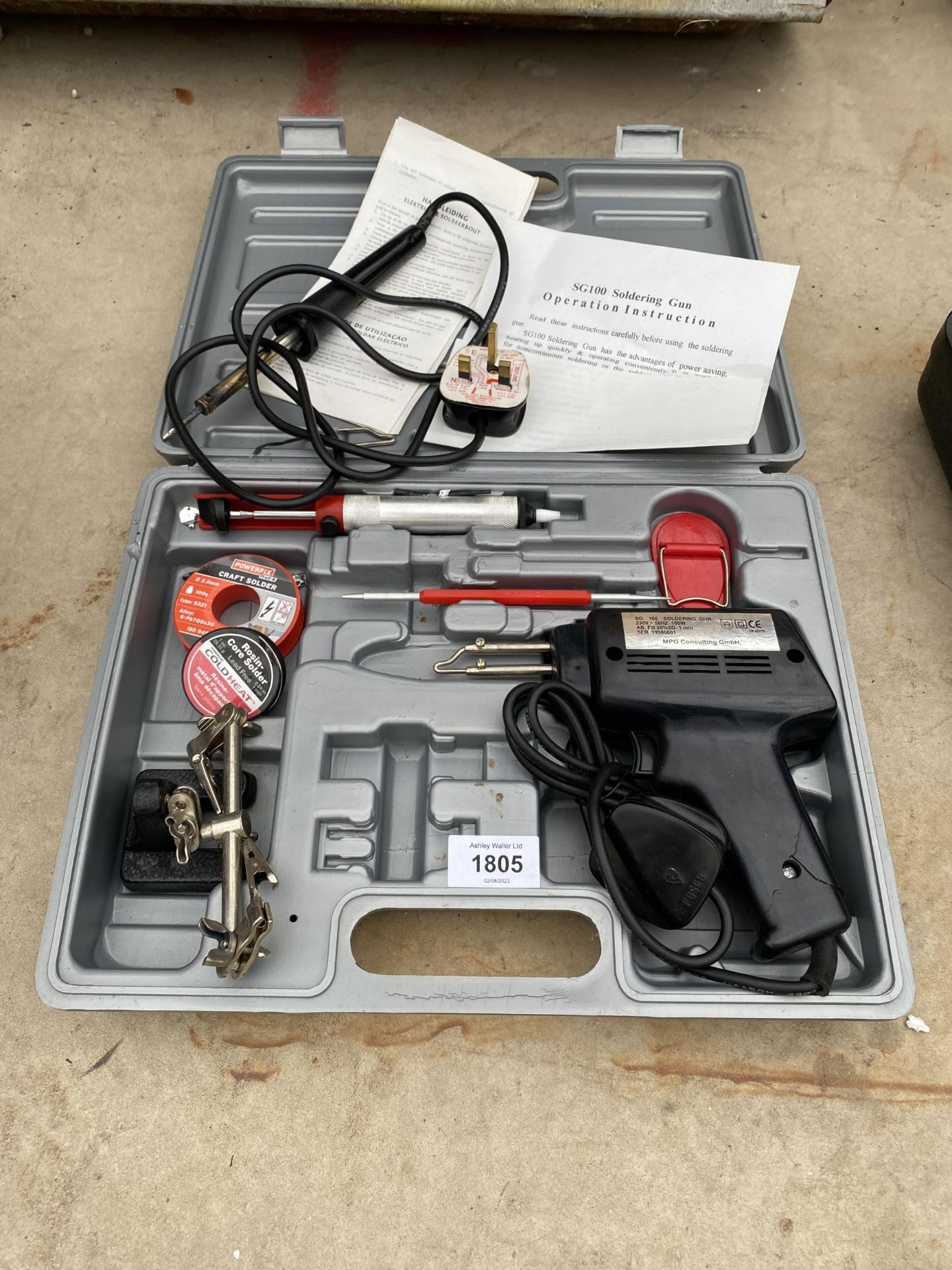 AN SG100 SOLDERING GUN WITH INSTRUCTIONS AND ATTATCHMENTS