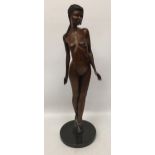 A BRONZE NUDE LADY BALLERINA FIGURE ON MARBLE BASE