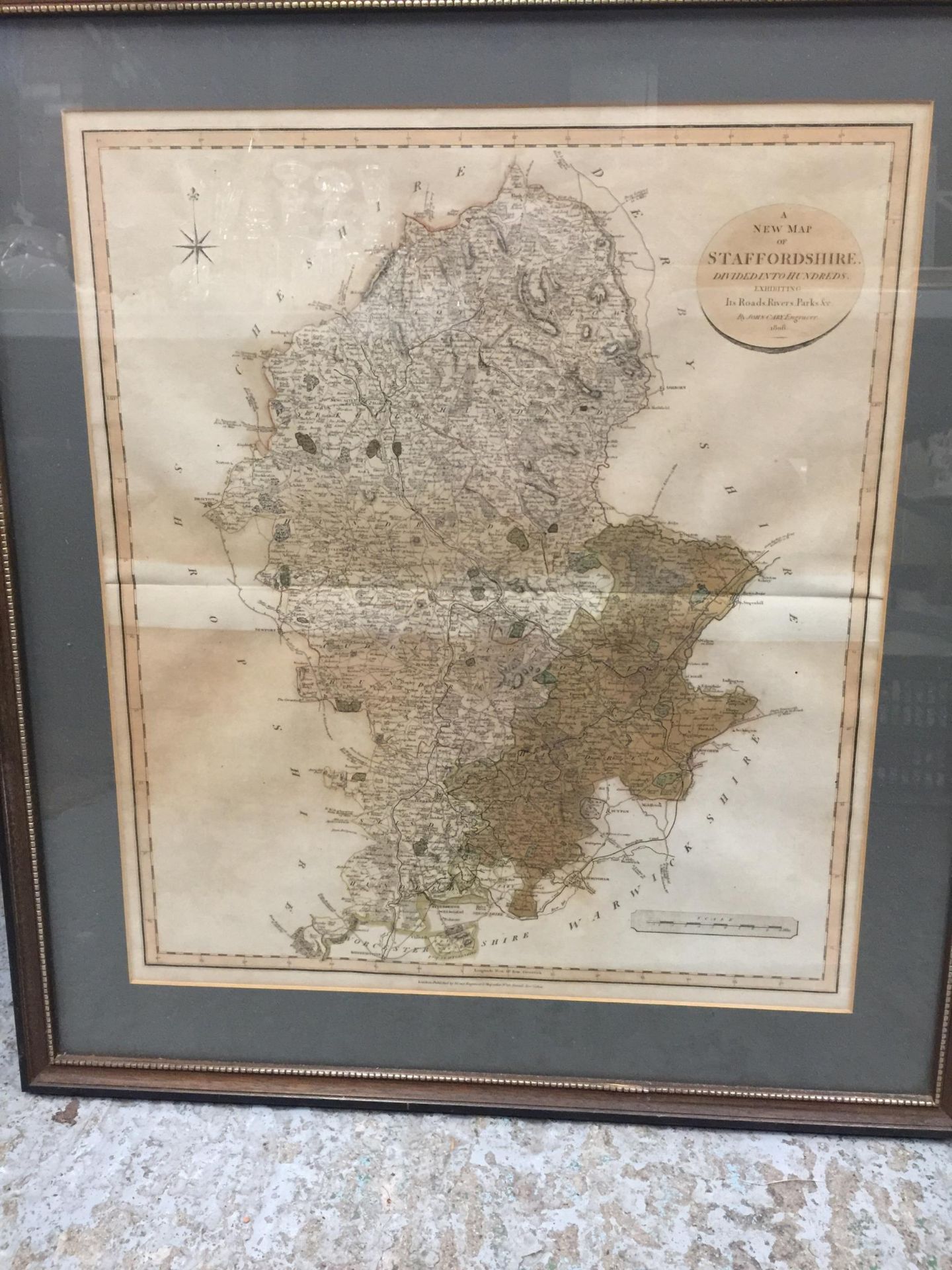 A VINTAGE FRAMED MAP OF STAFFORDSHIRE