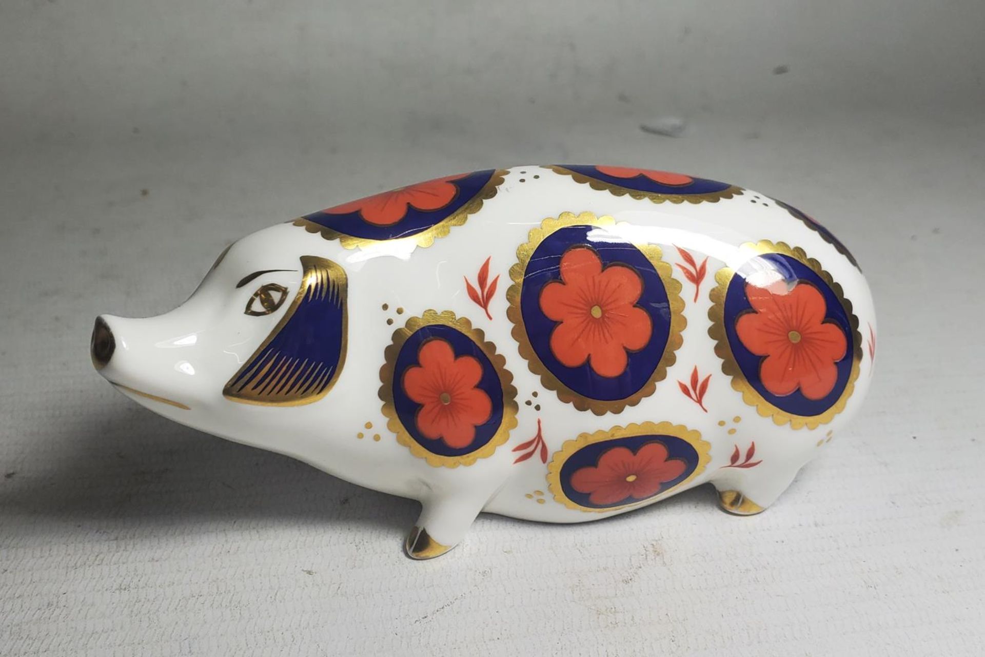 A ROYAL CROWN DERBY PIG (SECOND)