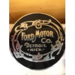 A LARGE BLACK AND CHROME 'FORD MOTOR CO., DETROIT, MICH' SIGN DIAMETER 50CM