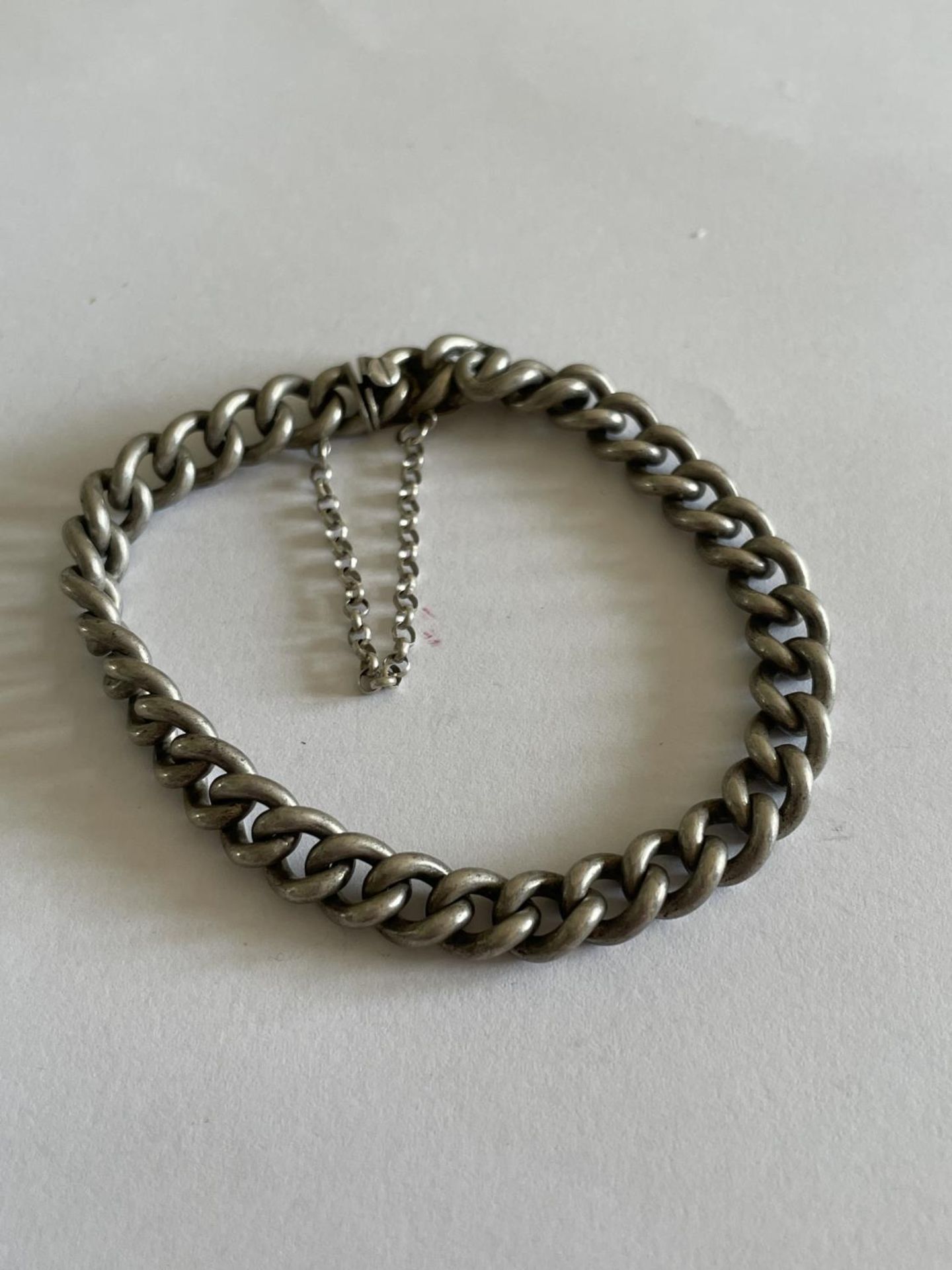 A HEAVY SILVER BRACELETS