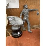 A VINTAGE METAL STATUE OF A MINER (A/F)