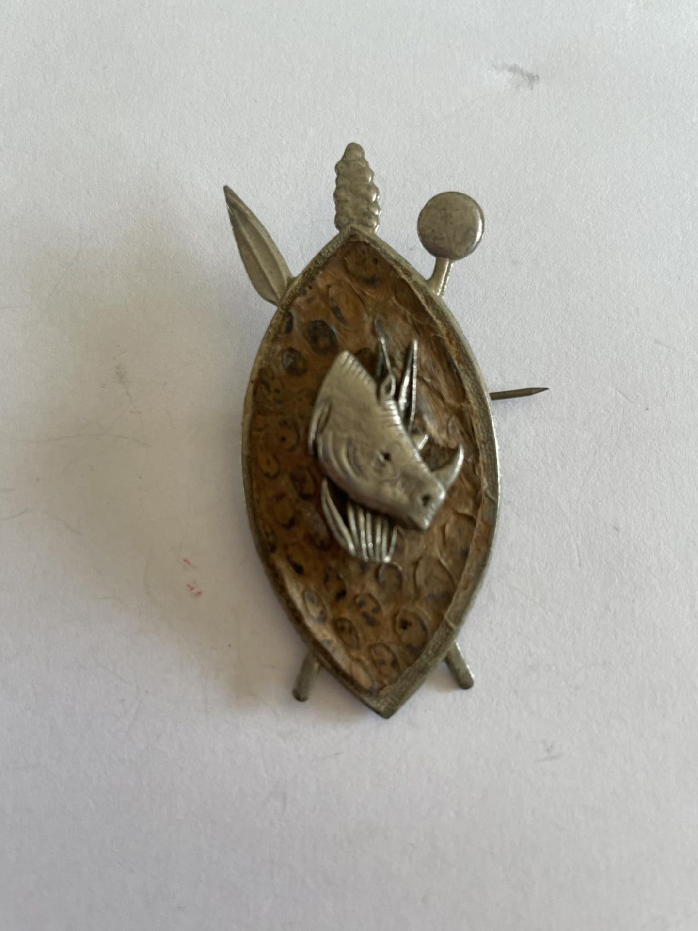 A SIMOA AFRICAN HAND MADE BROOCH