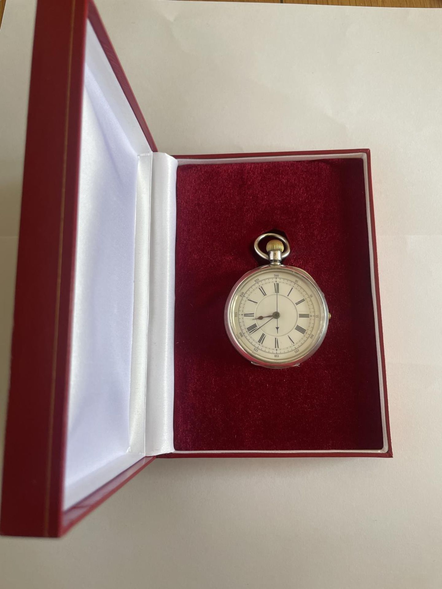 A RARE SILVER CHRONOGRAPH POCKET WATCH WITH WHITE FACE AND ROMAN NUMERALS IN ORIGINAL PRESENTATION