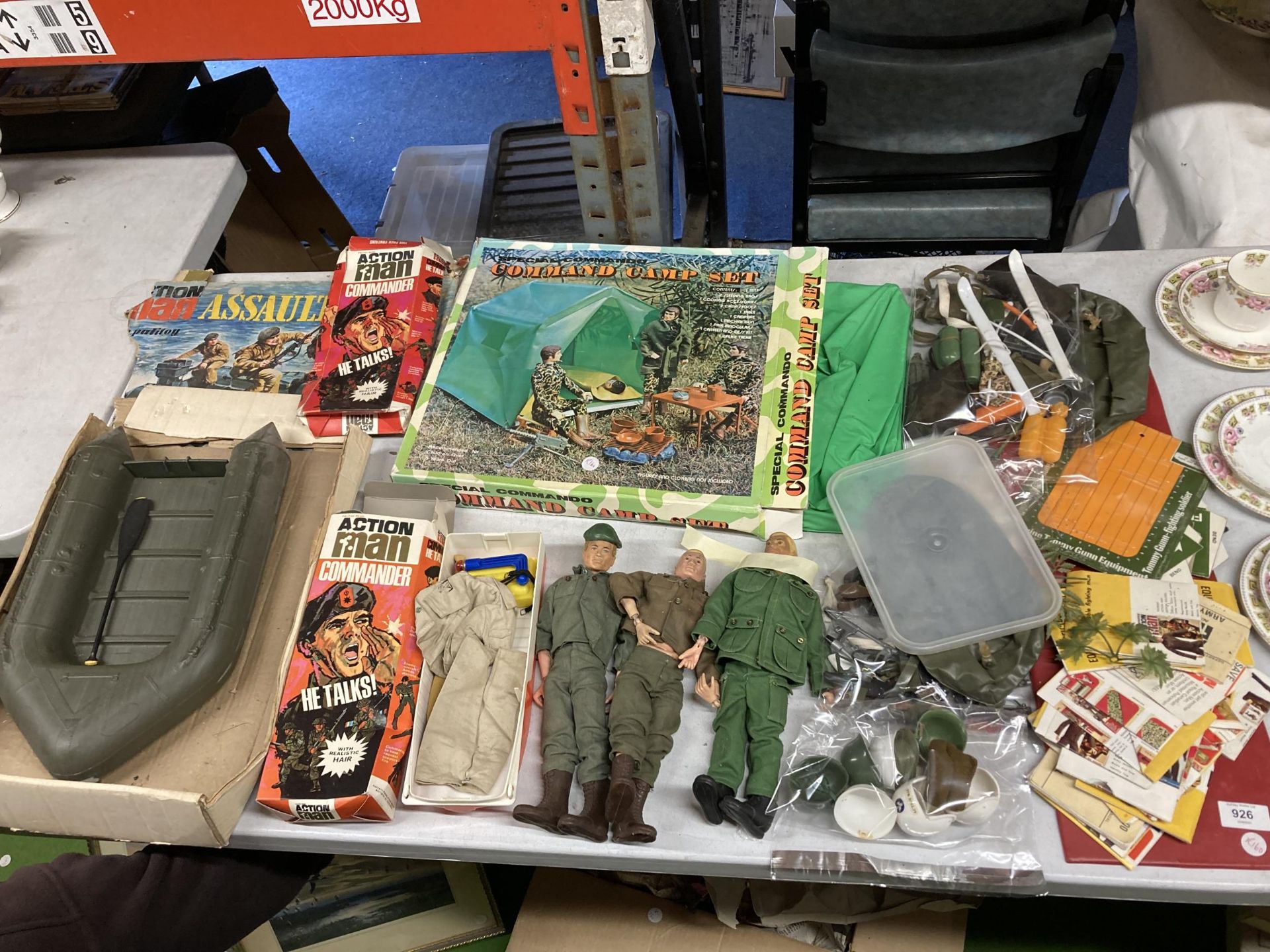 A COLLECTION OF ACTION MAN FIGURES AND ACCESSORIES, CAMP SET, DINGY, CLOTHES ETC