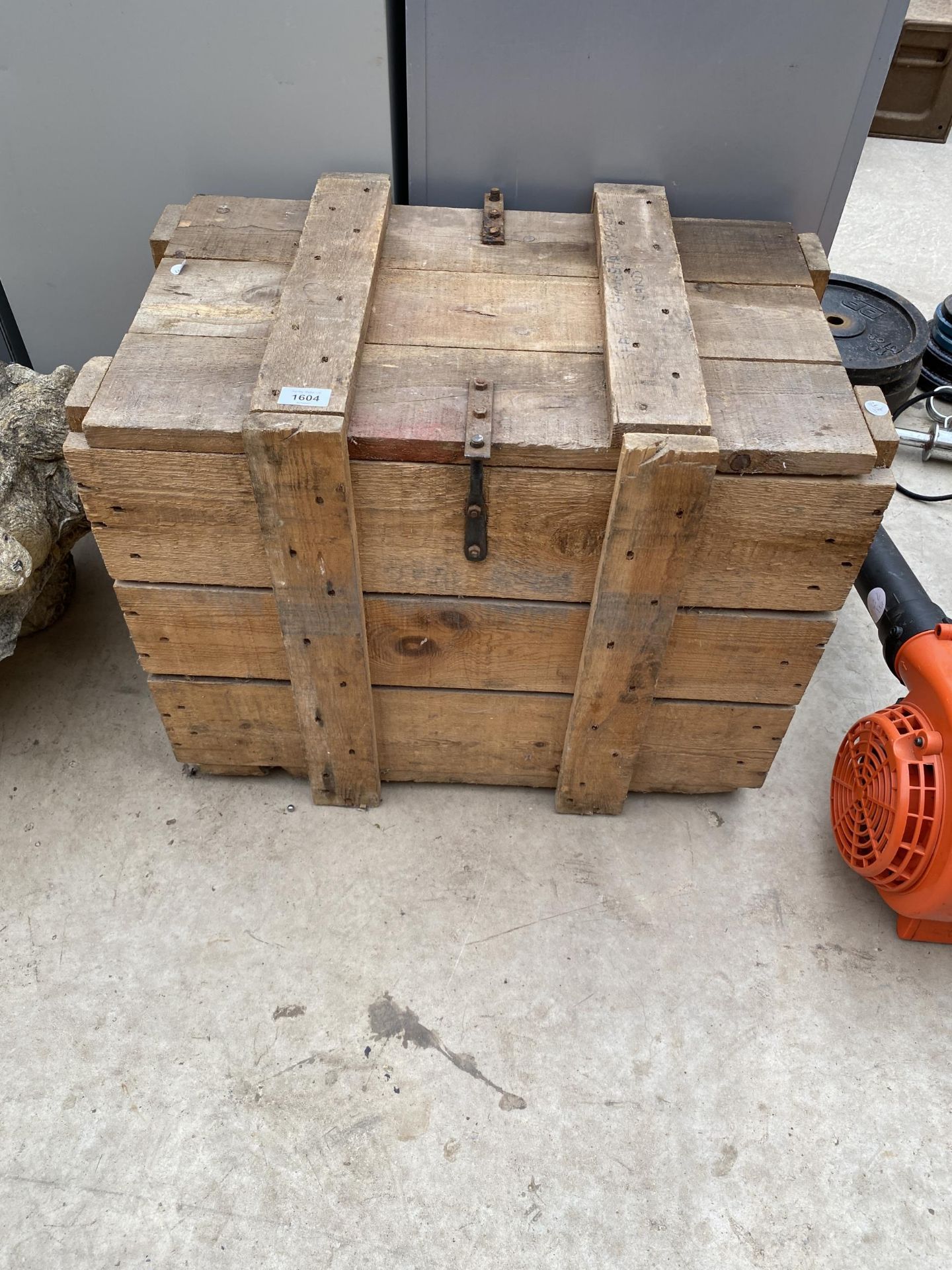 A WOODEN STOARGE CRATE WITH BOLT DOWN REMOVEABLE LID