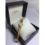 A LADIES GOLD PLATED SLIM DRESS WATCH