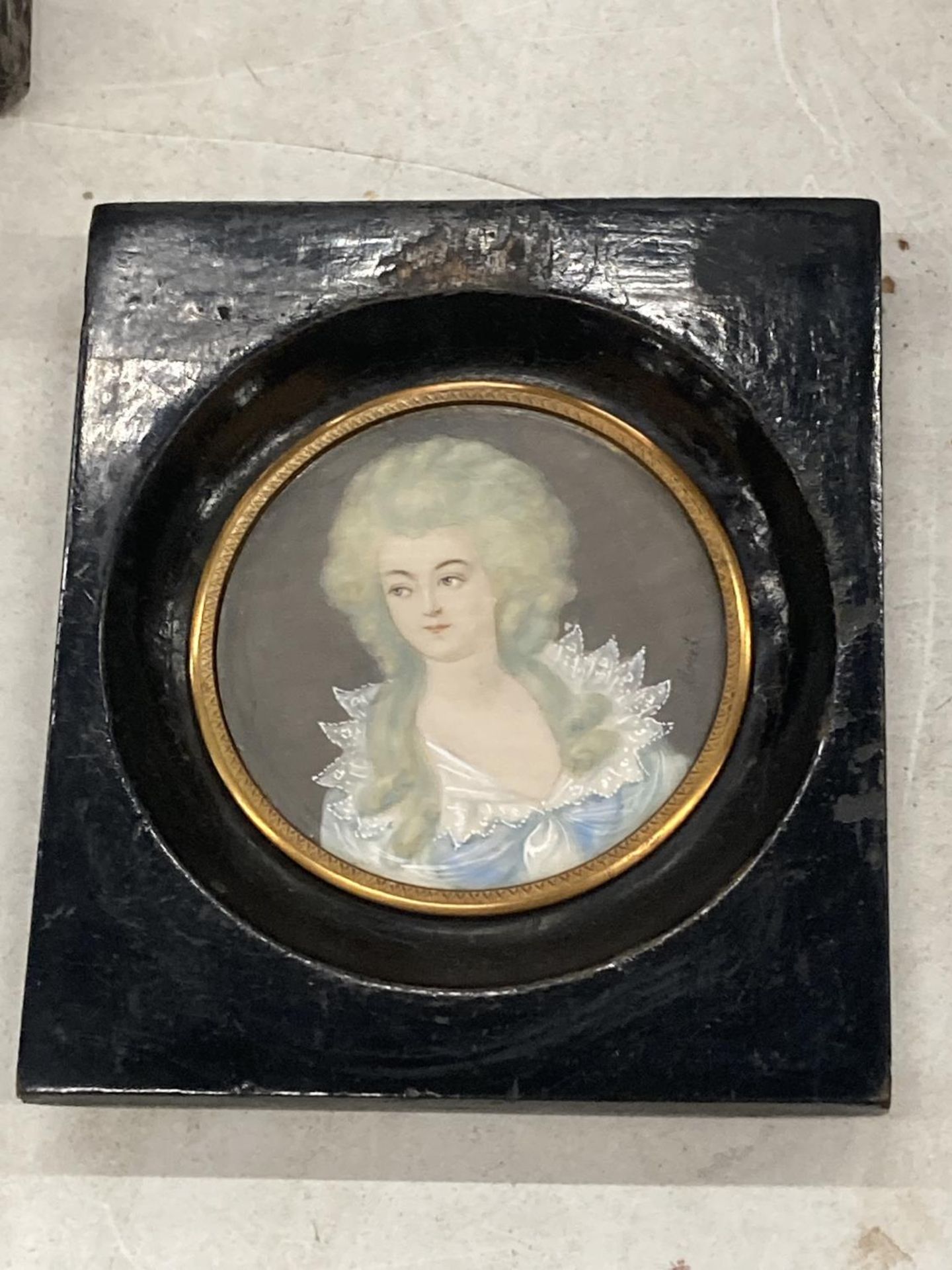 A 19TH CENTURY HAND PAINTED PORTRAIT OF A LADY, SIGNED MONET, IN EBONISED WOODEN FRAME, 10 X 9CM