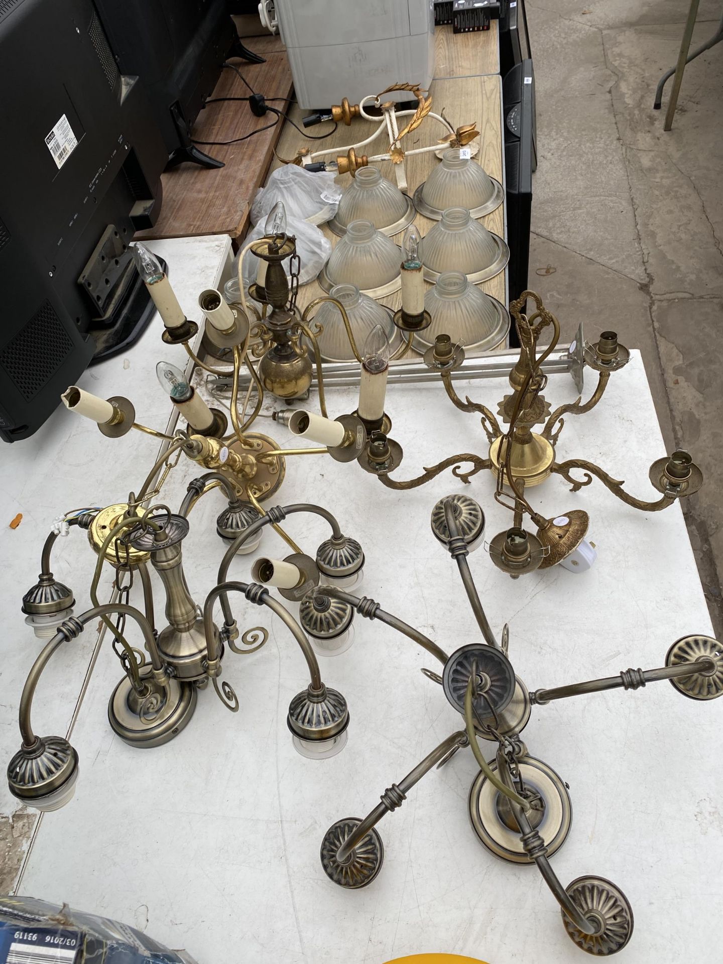 A LARGE ASSORTMENT OF LIGHT FITTINGS AND RETRO GLASS SHADES