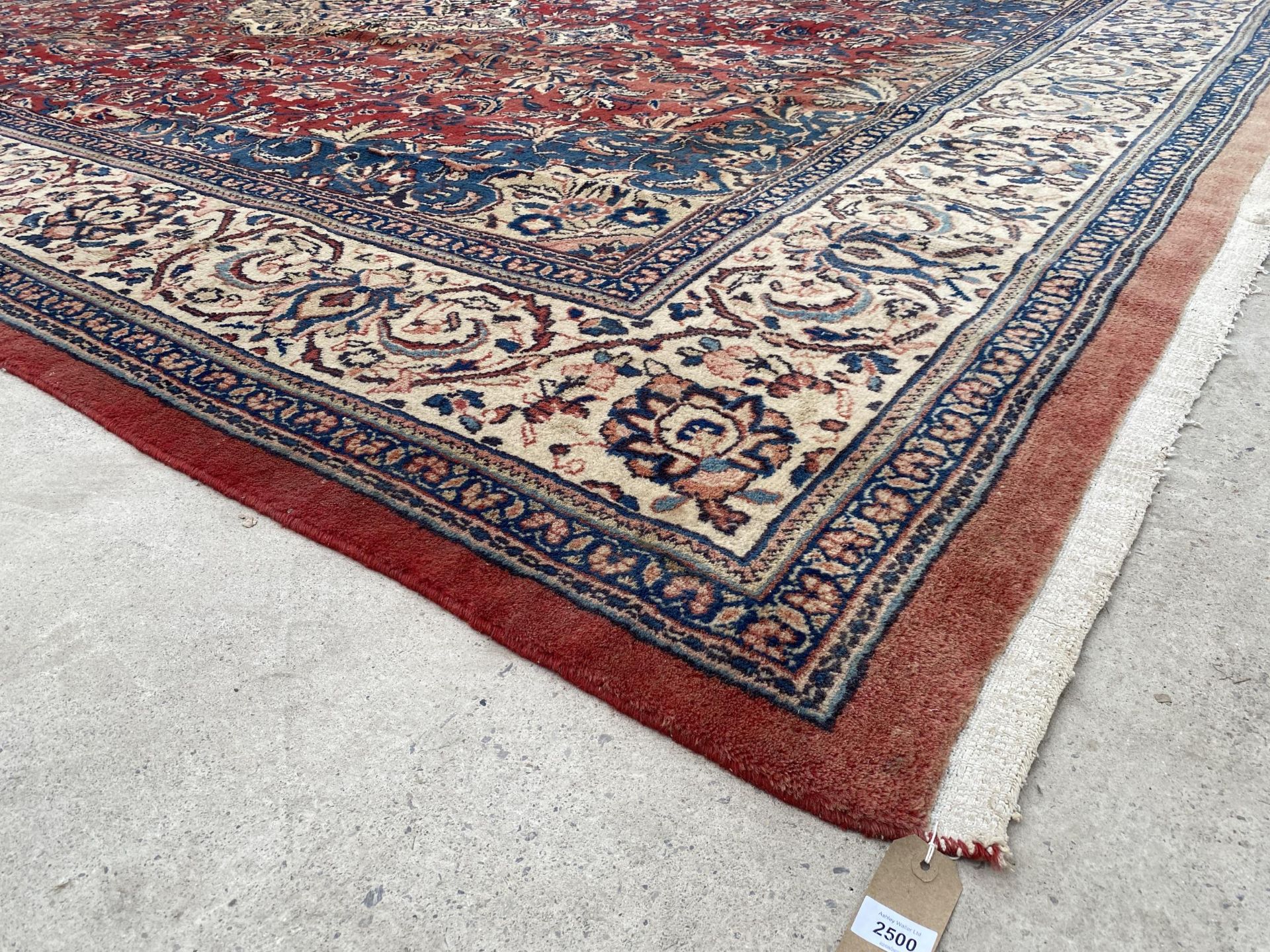 A LARGE RED PATTTERNED RUG (L:440CM)(W:320CM) - Image 3 of 4