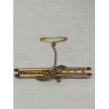 A 9CT BAR BROOCH LADDER SHAPED