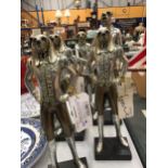 FIVE SILVER COLOURED FIGURES WITH DOG'S HEADS HEIGHT 30CM