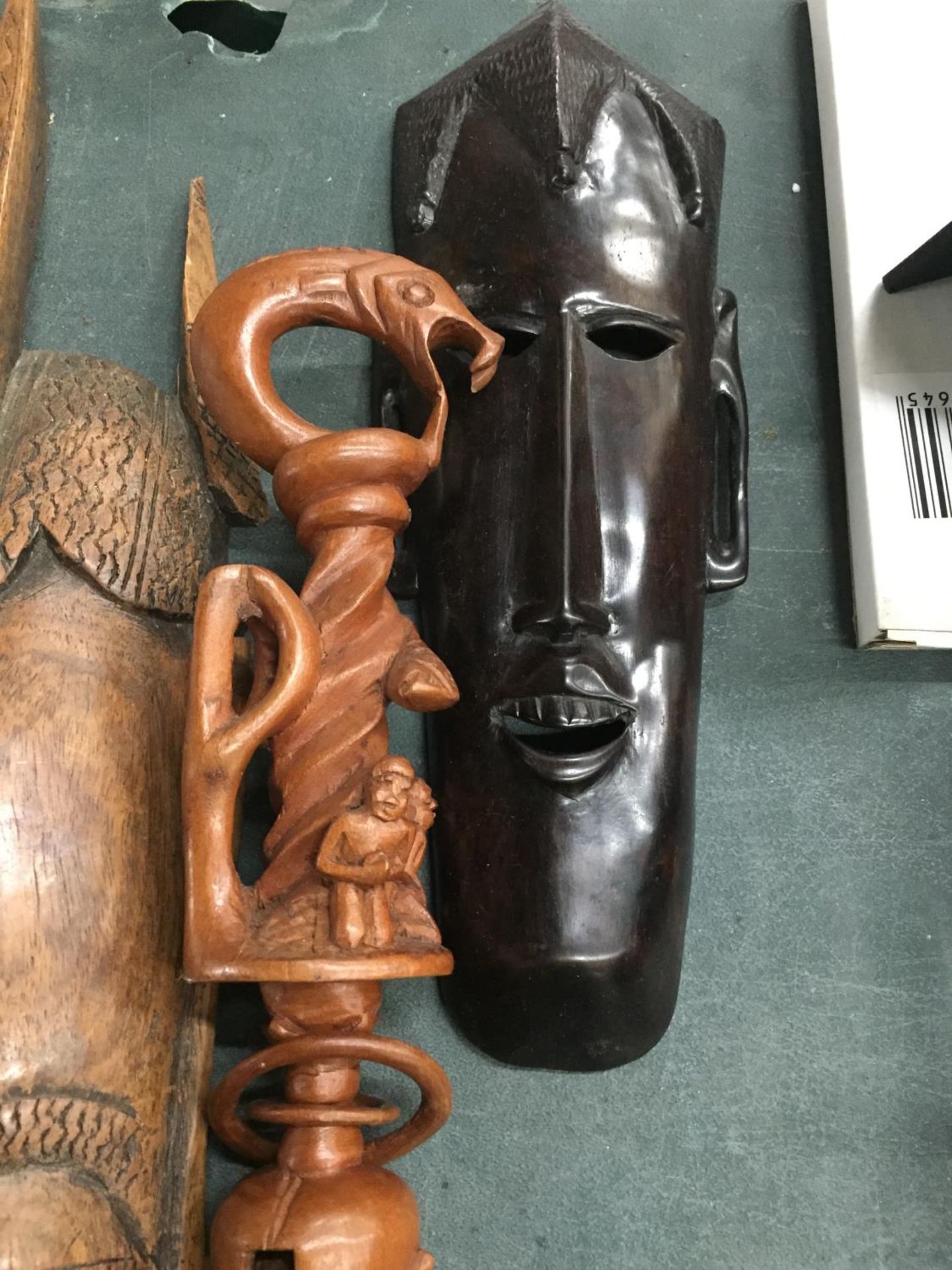 TWO AFRICAN STYLE FACE MASKS PLUS A TRIBAL STYLE CARVED STICK WITH SERPENT DESIGN - Bild 2 aus 4