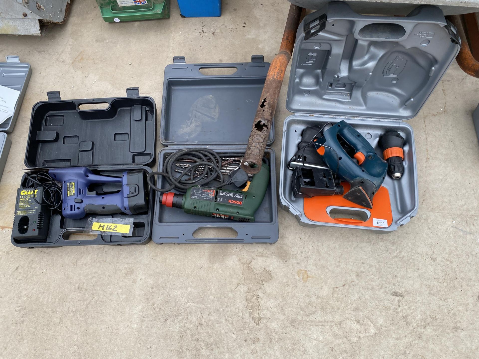 AN ASSORTMENT OF POWER TOOLS TO INCLUDE A BLACK AND DECKER MULTITOOL AND A BOSCH DRILL ETC