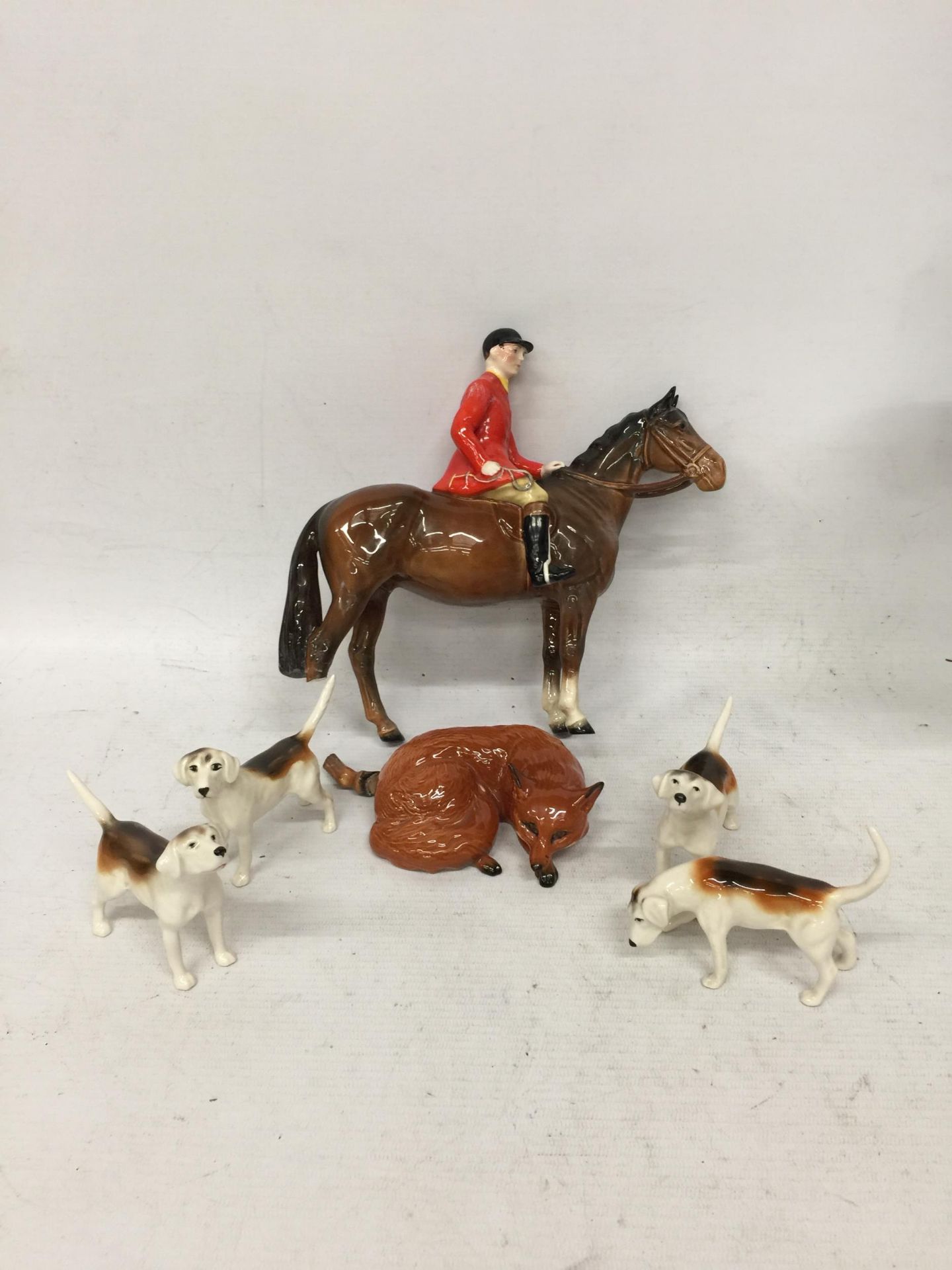 A BESWICK HORSE AND RIDER A/F, FOUR HOUNDS AND A FOX - Image 3 of 5