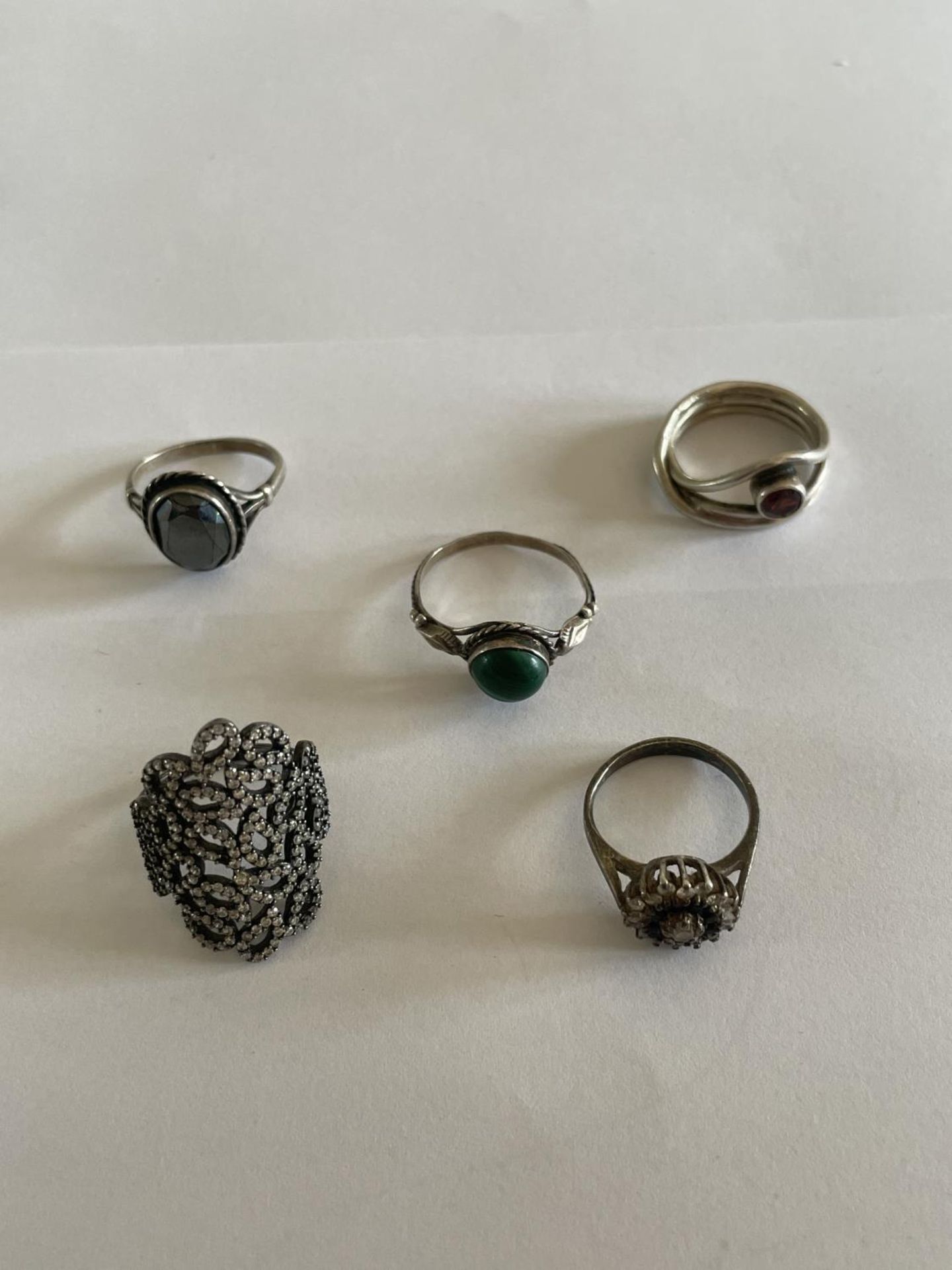 FIVE VARIOUS SILVER RINGS