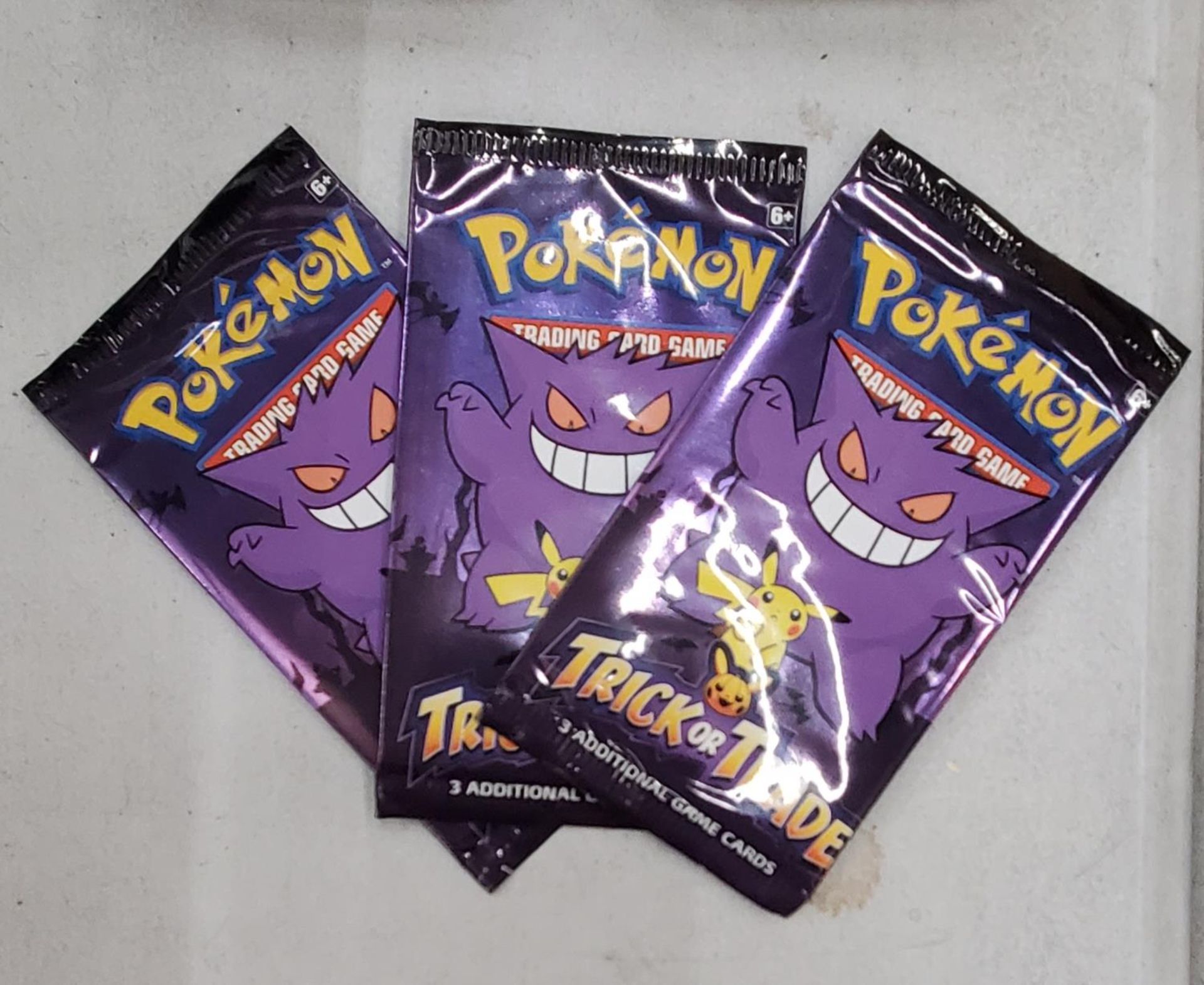THREE SEALED POKEMON TRICK OR TRADE BOO-STER PACKS