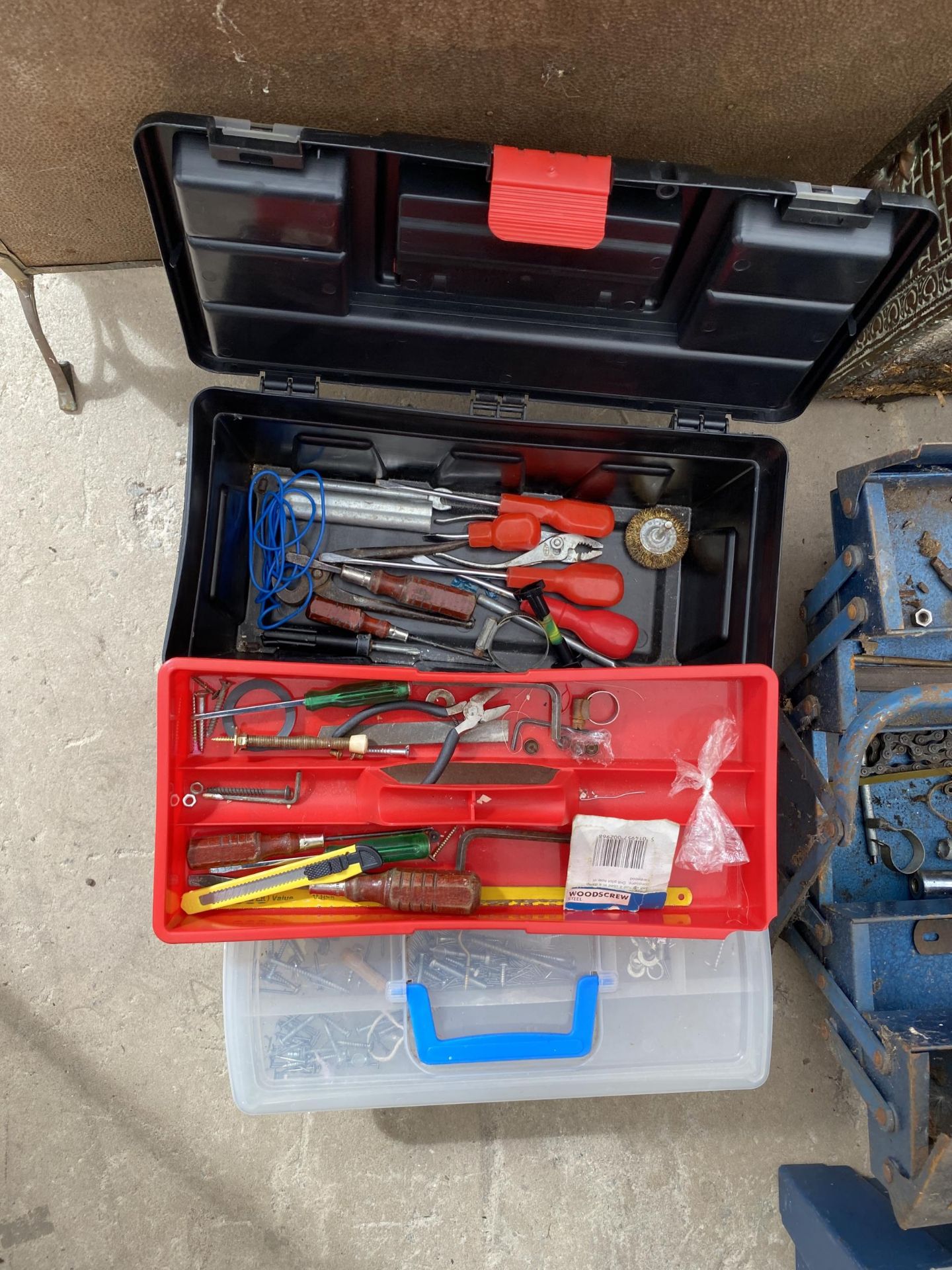 TWO PLASTIC TOOL BOXES CONTAINING AN ASSORTMENT OF TOOLS AND HARDWARE