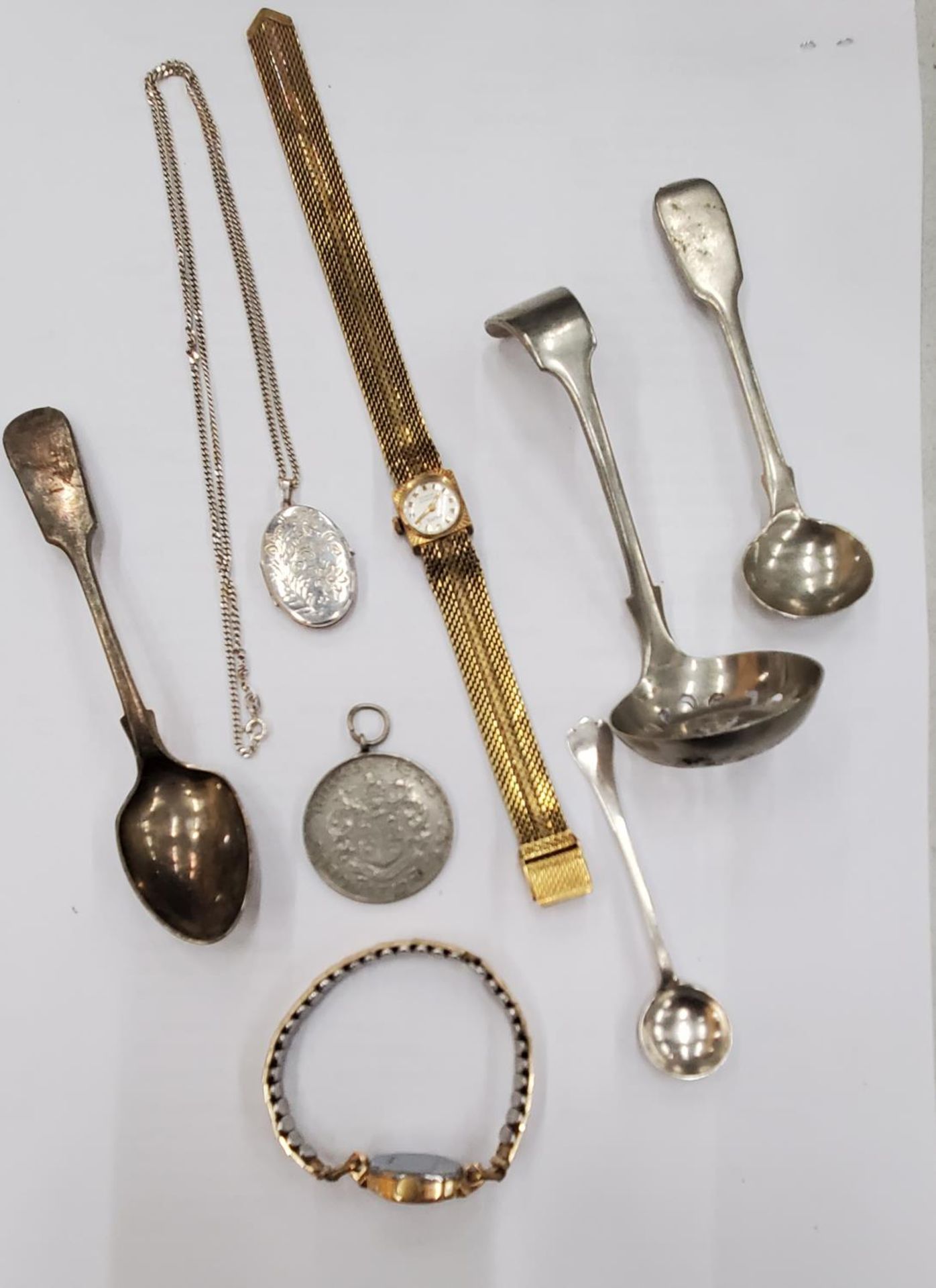 A SILVER LOCKET AND CHAIN, TWO VINTAGE LADIES WRISTWATCHES, FLATWARE, A KING GEORGE VI CORONATION