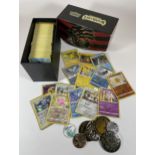 A TRAINER BOX OF ASSORTED POKEMON TRADING CARDS, HOLOS, TOKENS ETC