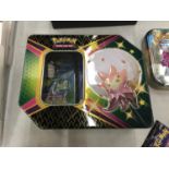 A COLLECTORS TIN OF POKEMON CARDS INCLUDING SHINIES, ETC - 100+